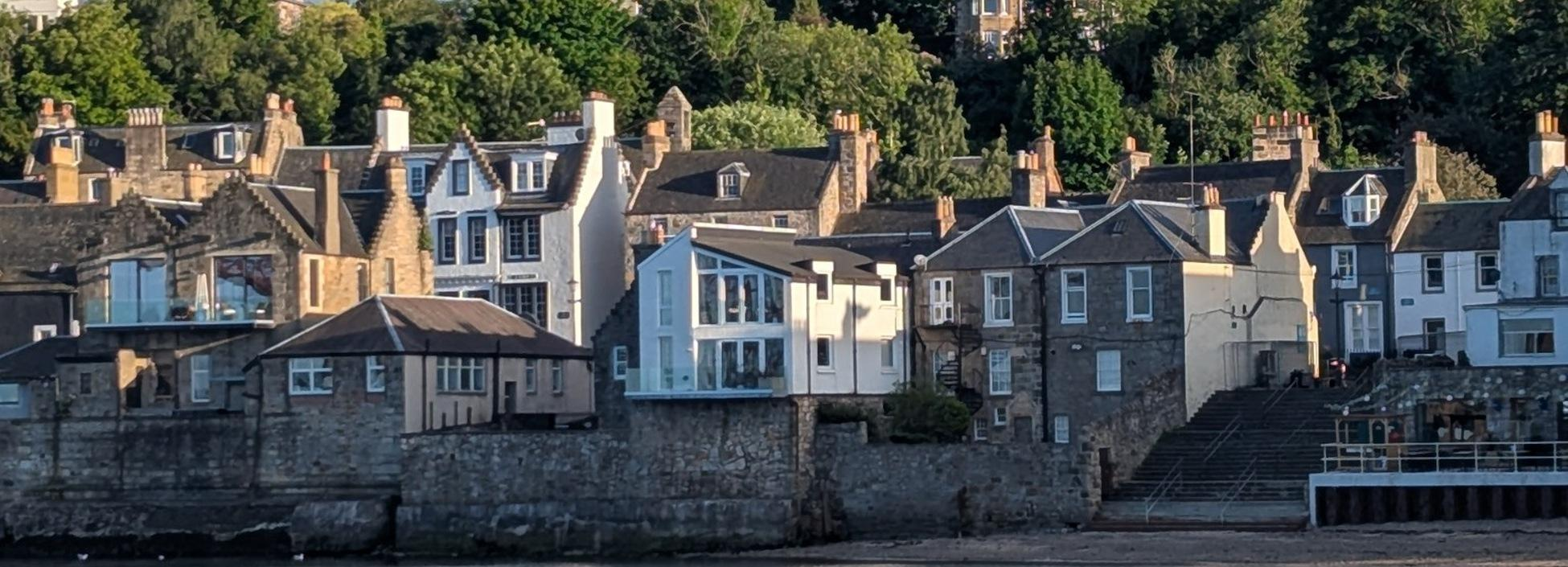 Historic South Queensferry waterfront houses along the shore of the Firth of Forth